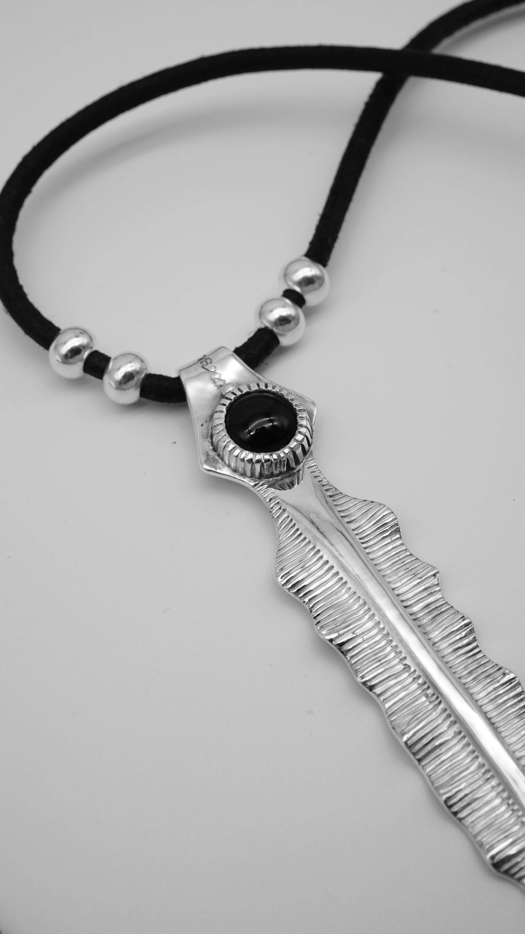 Handcrafted Sterling Silver Pendant with Black Onyx – Banana Leaf Inspired